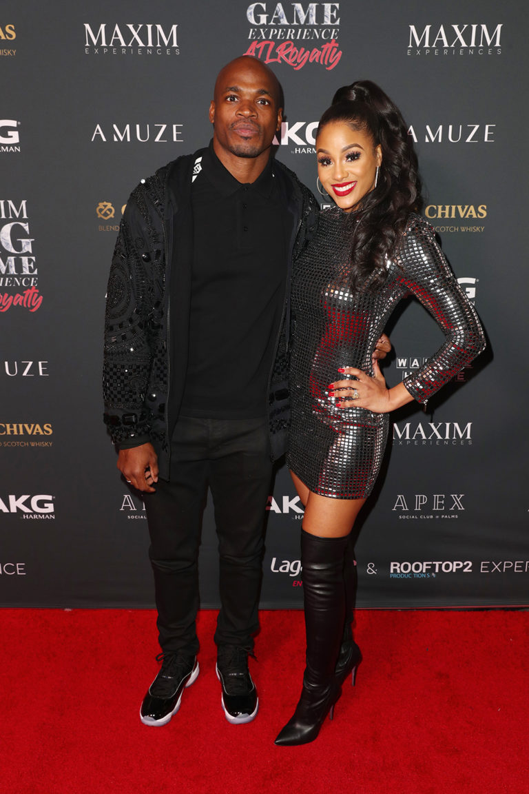 Adrian Peterson (L) and Ashley Brown Peterson attends The Maxim Big Game Experience (Photo by Joe Scarnici/Getty Images for Maxim)