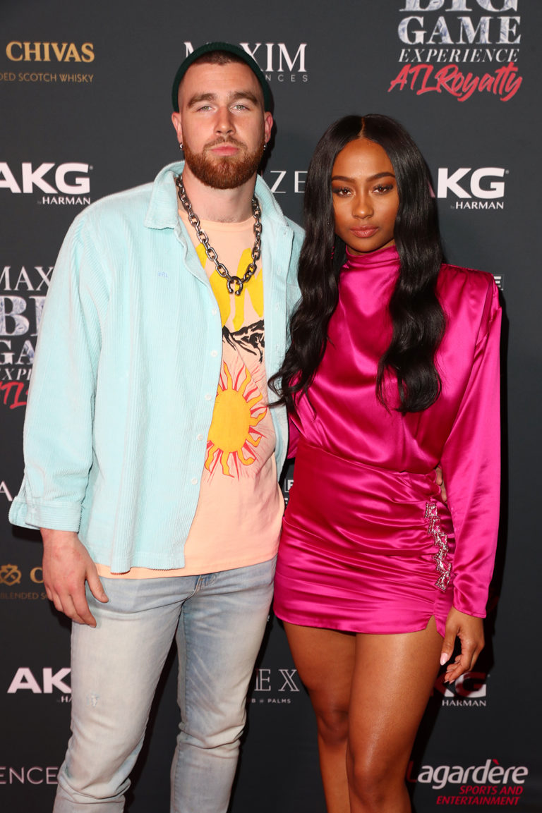 Travis Kelce (L) and Kayla Nicole attends The Maxim Big Game Experience (Photo by Joe Scarnici/Getty Images for Maxim)